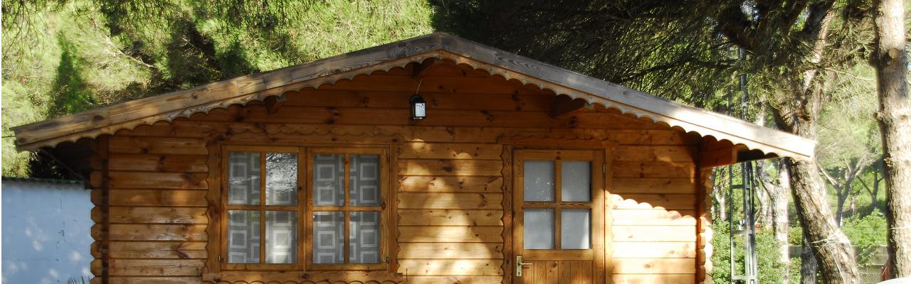 Our cosy log cabins under the trees - near one of the best beaches of Conil de la Frontera